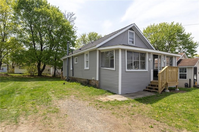 exterior space featuring a lawn
