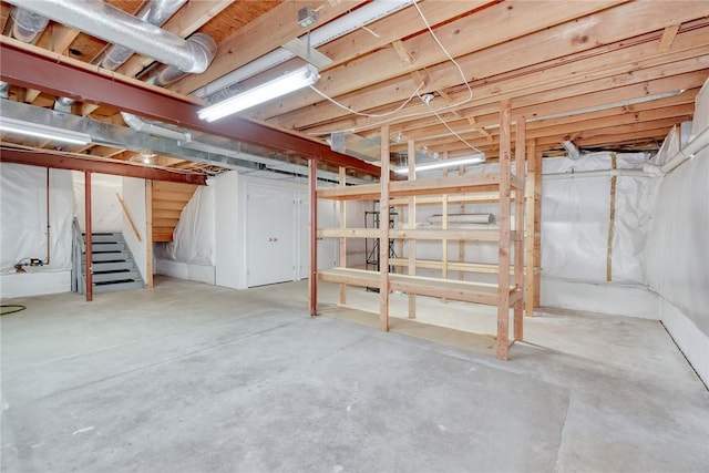 unfinished basement with stairway