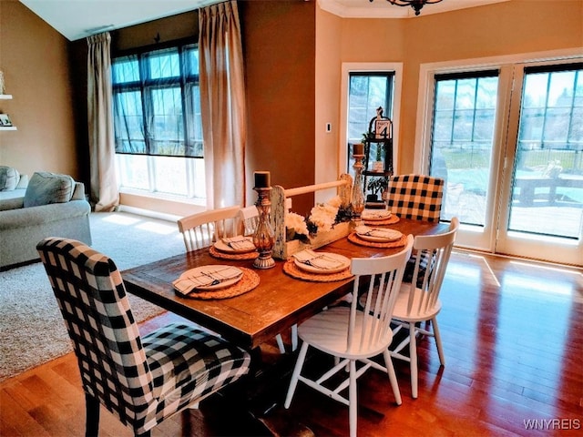 dining room with wood finished floors