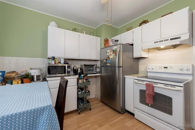 kitchen featuring light wood-style floors, light countertops, under cabinet range hood, white cabinets, and stainless steel appliances