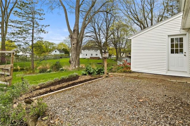 view of yard with fence