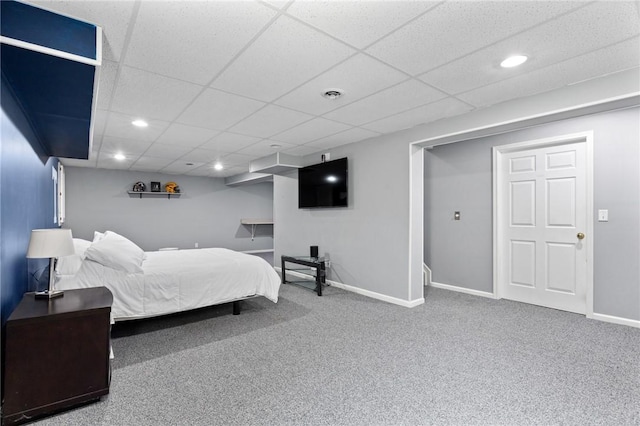 bedroom featuring a paneled ceiling, visible vents, carpet floors, baseboards, and recessed lighting