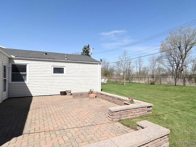 view of patio featuring fence