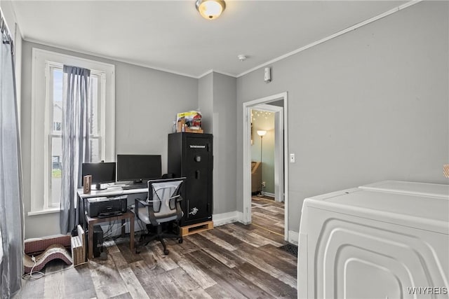 office featuring baseboards, ornamental molding, independent washer and dryer, and wood finished floors