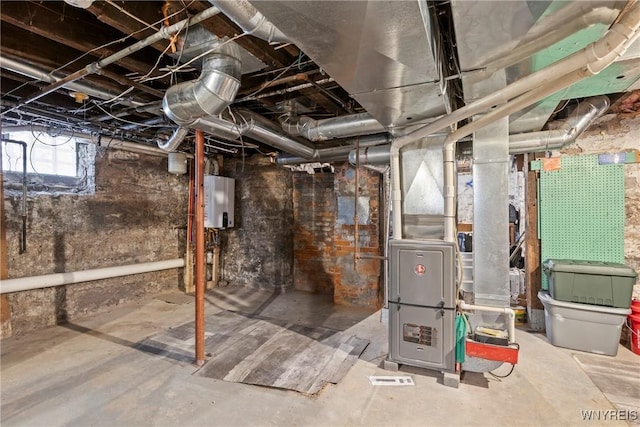 below grade area featuring heating unit