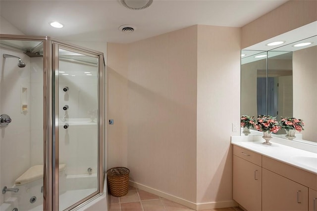 full bathroom featuring vanity, baseboards, tile patterned floors, and visible vents