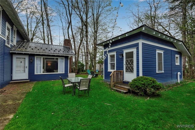 exterior space with outdoor dining space