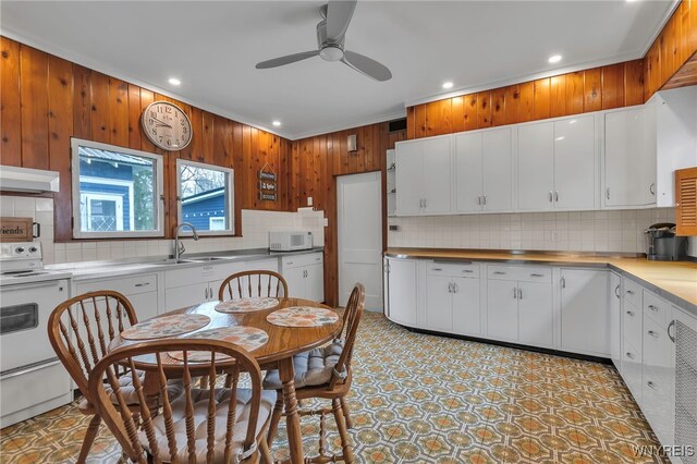 kitchen with decorative backsplash, white appliances, ceiling fan, recessed lighting, and under cabinet range hood