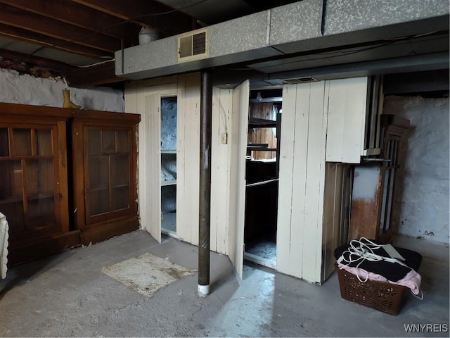 unfinished below grade area featuring visible vents