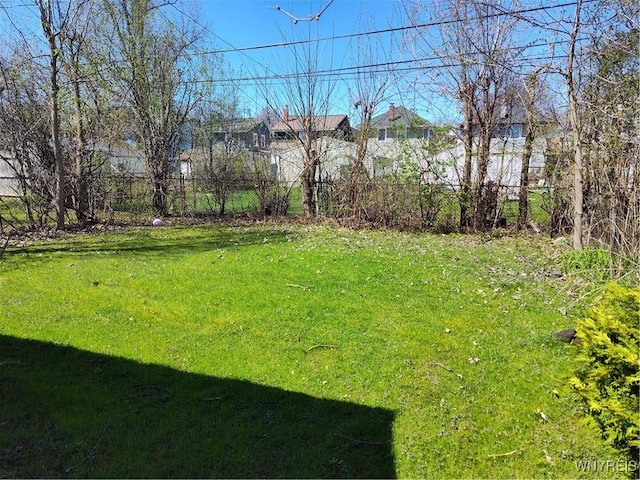 view of yard with fence