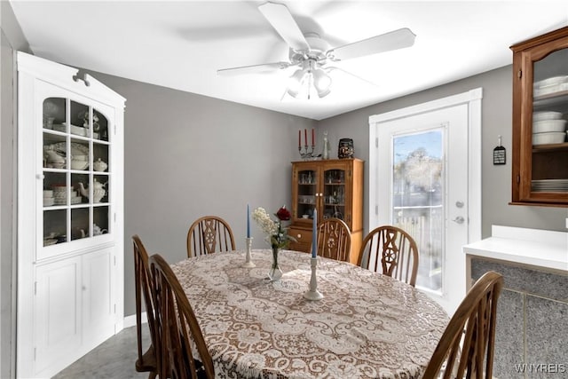 dining space with ceiling fan