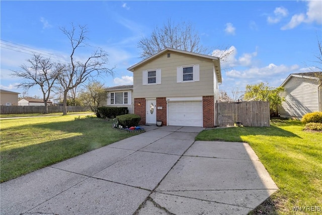 split level home with brick siding, a garage, a front lawn, and fence