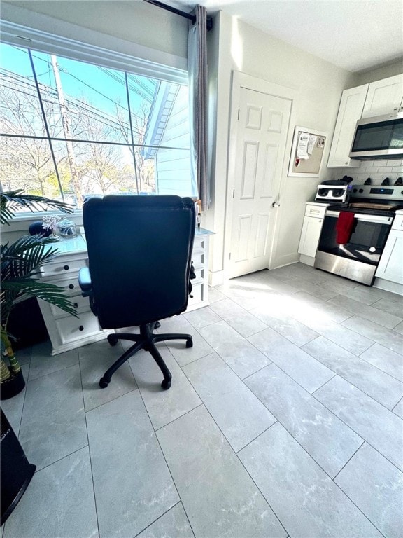 office featuring light tile patterned flooring