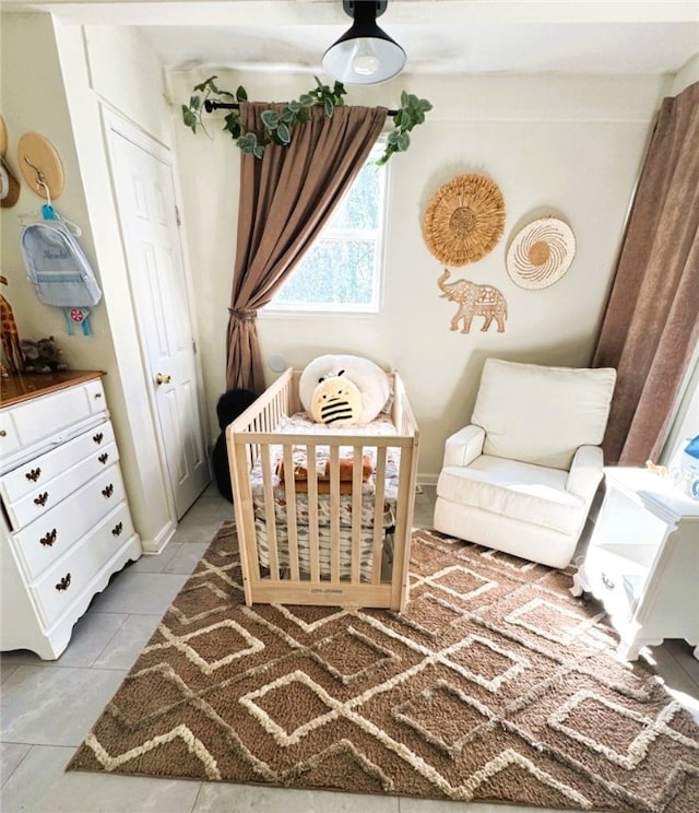 sitting room with tile patterned floors