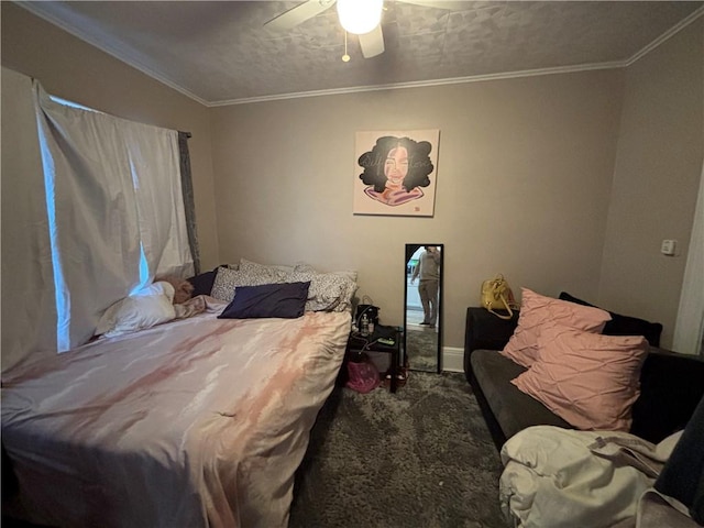 bedroom with crown molding, a ceiling fan, and carpet