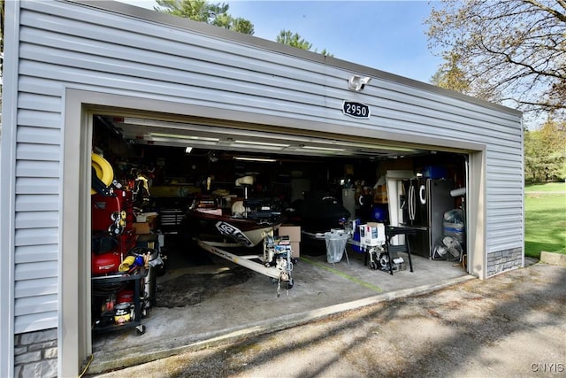 garage featuring freestanding refrigerator