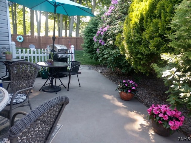 view of patio / terrace with fence and outdoor dining area