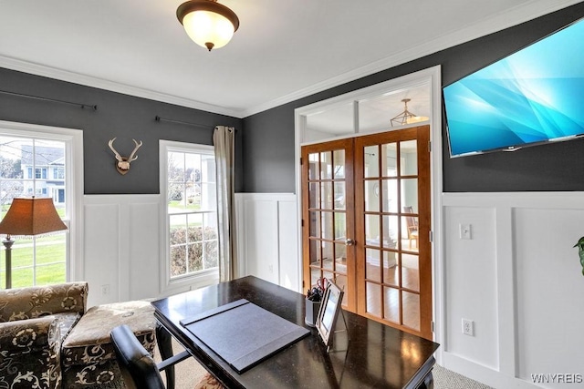 office space with wainscoting, french doors, and a decorative wall