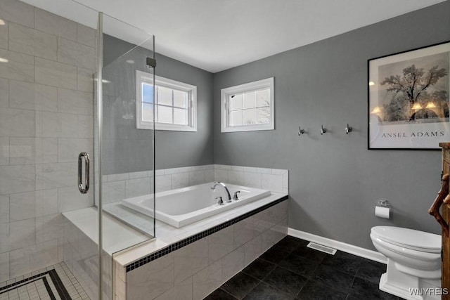 full bathroom with tile patterned flooring, toilet, baseboards, a bath, and a stall shower