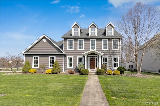 view of front of home with a front yard