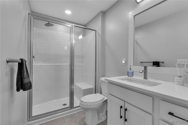 full bath with tile patterned flooring, vanity, toilet, and a shower stall