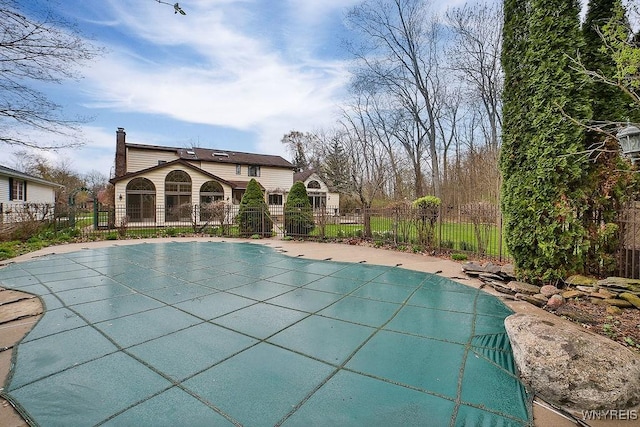 view of pool featuring fence and a fenced in pool