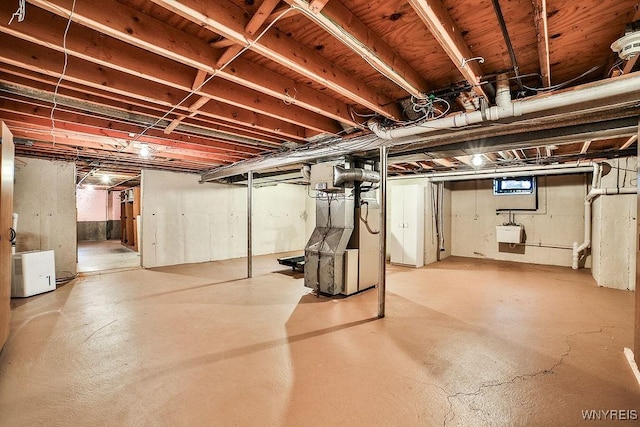 basement with heating unit