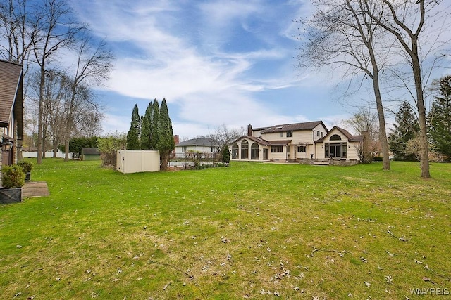 view of yard with fence