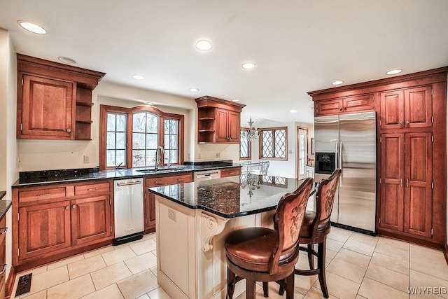 kitchen with stainless steel appliances, open shelves, recessed lighting, and a sink
