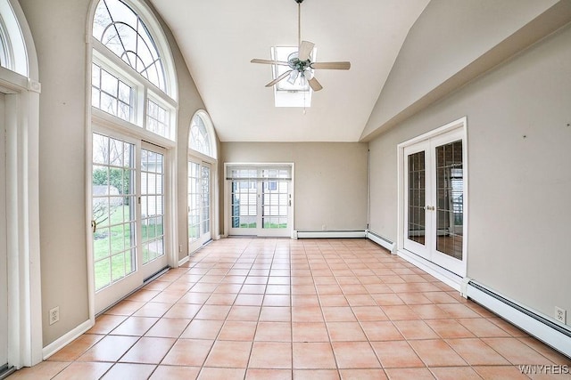 unfurnished sunroom with a healthy amount of sunlight, baseboard heating, french doors, and a baseboard heating unit