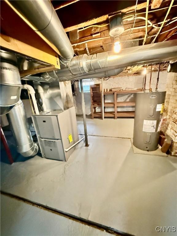 unfinished below grade area with water heater and heating unit