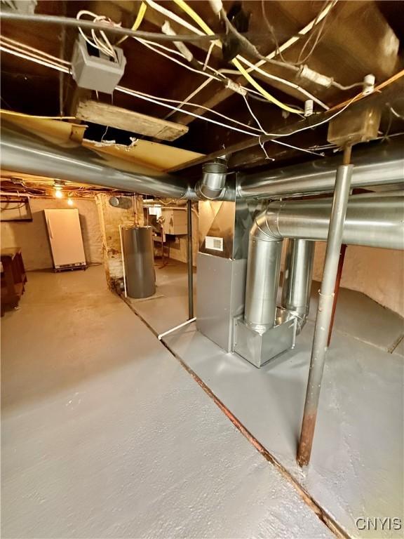 unfinished basement with water heater