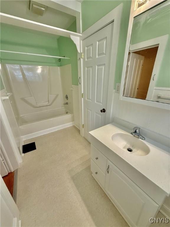 bathroom featuring vanity and washtub / shower combination