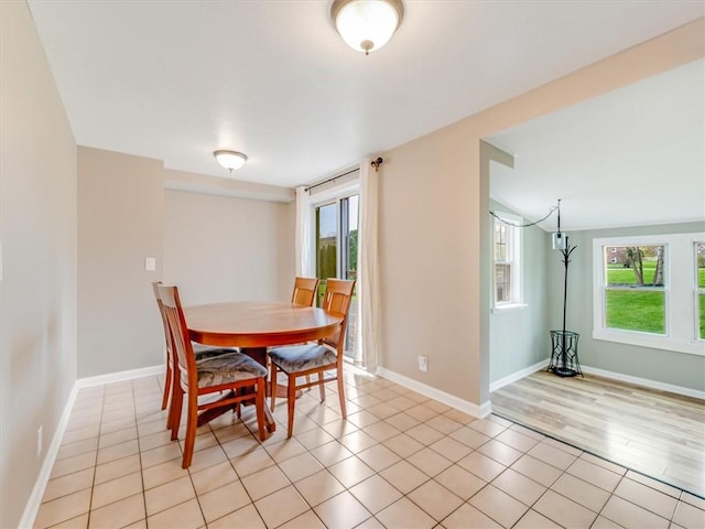 dining space with baseboards