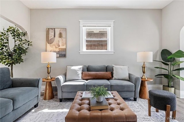 living room featuring baseboards