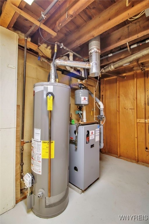 utility room with gas water heater