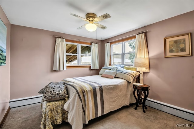 carpeted bedroom with baseboards, ceiling fan, and a baseboard radiator