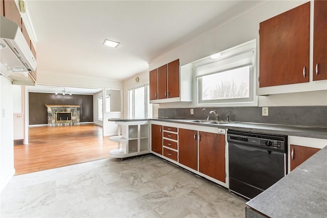 kitchen featuring light wood-style floors, open floor plan, black dishwasher, a sink, and exhaust hood
