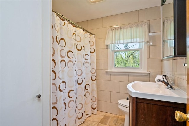 full bathroom with toilet, tile walls, a shower with shower curtain, and vanity