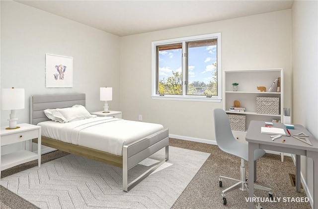 bedroom featuring baseboards and carpet floors