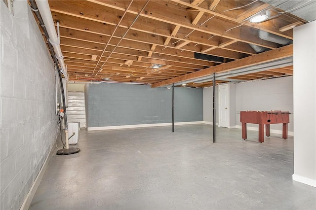 below grade area with concrete block wall and baseboards