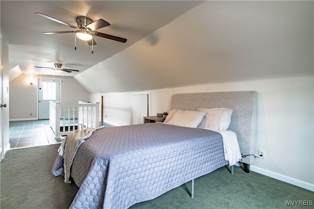 bedroom with vaulted ceiling, baseboards, a ceiling fan, and carpet flooring