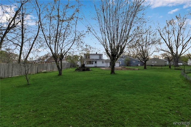 view of yard with fence