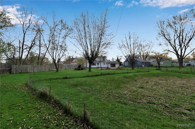 view of yard with fence