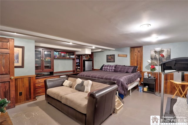 bedroom with finished concrete floors