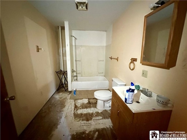 bathroom featuring shower / tub combination, toilet, and vanity