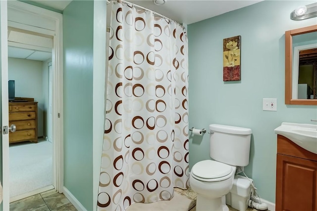 bathroom with toilet, a shower with shower curtain, and vanity