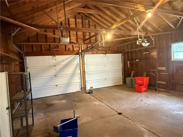 garage featuring a garage door opener