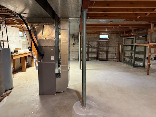 below grade area with heating unit and water heater