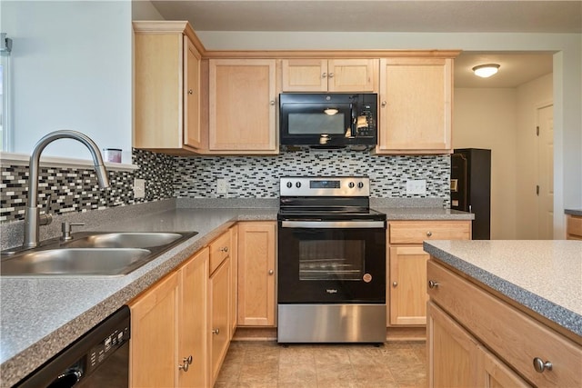 kitchen featuring a sink, light brown cabinetry, and black appliances